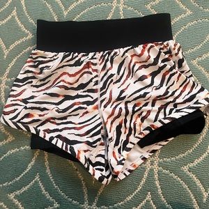Fabletics Biker zebra print athletic biker shorts with shorts.  Pockets.